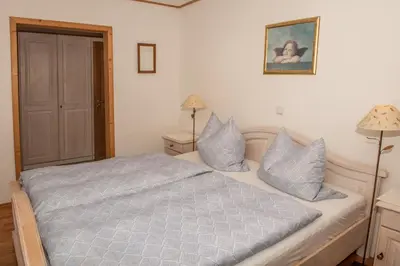 Ein Bett oder Betten in einem Zimmer der Unterkunft Jagahäusel Appartement Gitti