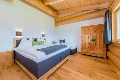 Ein Bett oder Betten in einem Zimmer der Unterkunft Ferienhaus Obwallhof