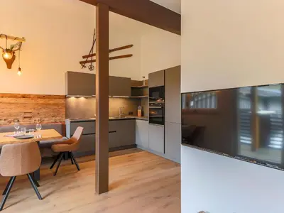 Küche/Küchenzeile in der Unterkunft Modern penthouse with balcony in Gasteig