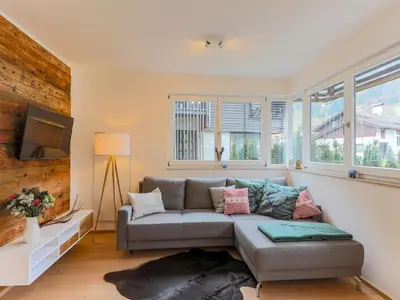 Ein Sitzbereich in der Unterkunft Chalet with 2 apartments in Kirchberg