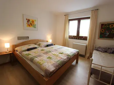 Ein Bett oder Betten in einem Zimmer der Unterkunft Chalet in St Johann near Ski Slopes