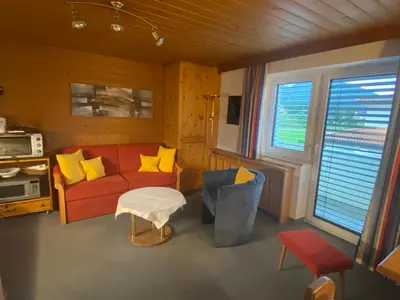 Ein Sitzbereich in der Unterkunft Haus am Achengrund