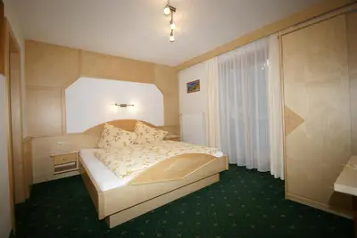 Ein Bett oder Betten in einem Zimmer der Unterkunft Ferienwohnung Bergheim