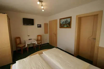 Ein Bett oder Betten in einem Zimmer der Unterkunft Ferienwohnung Bergheim