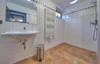 Ein Badezimmer in der Unterkunft D-Town Lodge
