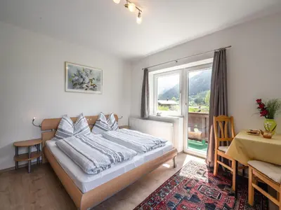 Ein Bett oder Betten in einem Zimmer der Unterkunft Cottage in Muhlbach near Kitzbuhel Ski Area