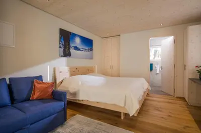 Ein Bett oder Betten in einem Zimmer der Unterkunft powderhome