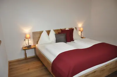 Ein Bett oder Betten in einem Zimmer der Unterkunft Ferienwohnung Christian
