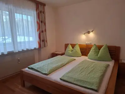 Ein Bett oder Betten in einem Zimmer der Unterkunft Haus Fichtenblick