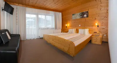 Ein Bett oder Betten in einem Zimmer der Unterkunft Pension Anderla
