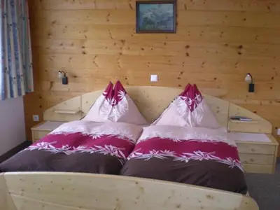 Ein Bett oder Betten in einem Zimmer der Unterkunft Pension Anderla