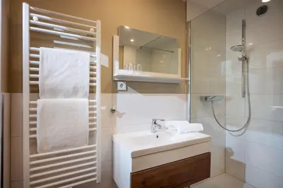 Ein Badezimmer in der Unterkunft Hotel Baumgarten & Chalet Baumgarten