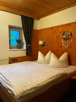 Ein Bett oder Betten in einem Zimmer der Unterkunft Landhaus Geisler