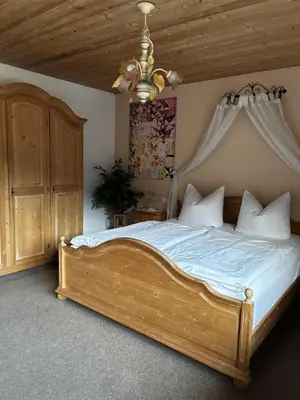 Ein Bett oder Betten in einem Zimmer der Unterkunft Landhaus Geisler