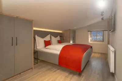 Ein Bett oder Betten in einem Zimmer der Unterkunft Appartements Erwin & Eleonore Hüttl - Penthouse