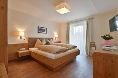 Ein Bett oder Betten in einem Zimmer der Unterkunft Berggasthaus Steinerkogl