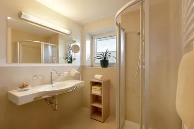 Ein Badezimmer in der Unterkunft Berggasthaus Steinerkogl