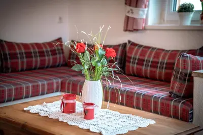 Ein Sitzbereich in der Unterkunft Apartment Großvenedigerblick