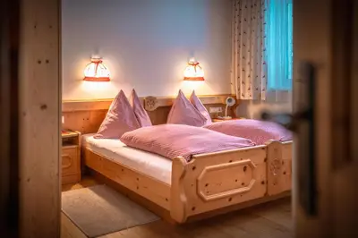 Ein Bett oder Betten in einem Zimmer der Unterkunft Apartment Großvenedigerblick