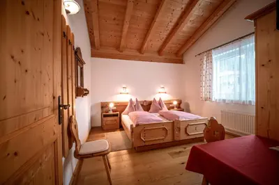 Ein Bett oder Betten in einem Zimmer der Unterkunft Apartment Großvenedigerblick