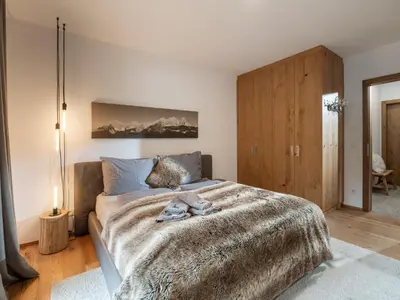 Ein Bett oder Betten in einem Zimmer der Unterkunft Ferienwohnung Hammerwirt