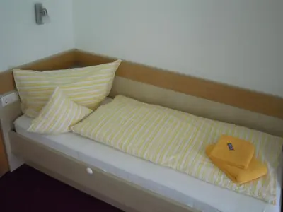 Ein Bett oder Betten in einem Zimmer der Unterkunft Appartements NEUStockach