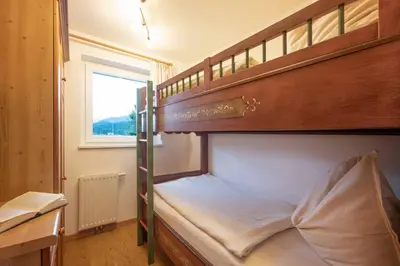 Ein Bett oder Betten in einem Zimmer der Unterkunft Exclusive Appartement Chalet