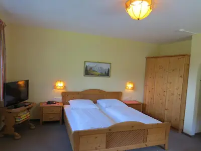 Ein Bett oder Betten in einem Zimmer der Unterkunft Hotel Kraftquelle Schlossblick