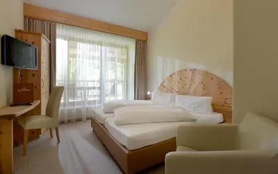 Ein Bett oder Betten in einem Zimmer der Unterkunft Hotel Kraftquelle Schlossblick
