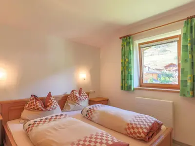 Ein Bett oder Betten in einem Zimmer der Unterkunft Chalet in Bramberg near Ski Slopes