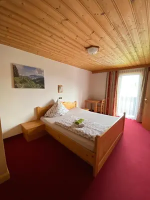 Ein Bett oder Betten in einem Zimmer der Unterkunft Pension Leitenhof