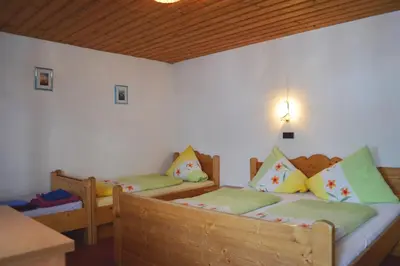 Ein Bett oder Betten in einem Zimmer der Unterkunft Pension Leitenhof