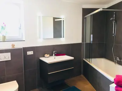 Ein Badezimmer in der Unterkunft Apartment LUIZ