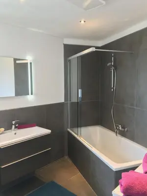 Ein Badezimmer in der Unterkunft Apartment LUIZ