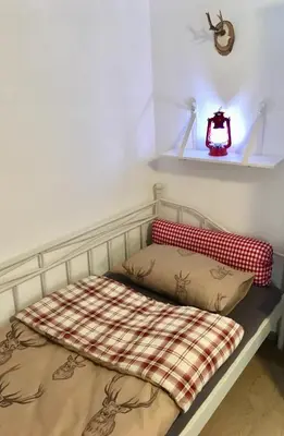 Ein Bett oder Betten in einem Zimmer der Unterkunft Untersteinhof