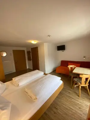 Ein Bett oder Betten in einem Zimmer der Unterkunft Landhaus Staudacher