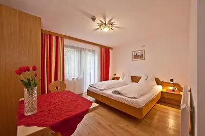 Ein Bett oder Betten in einem Zimmer der Unterkunft Landhaus Staudacher