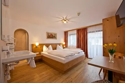 Ein Bett oder Betten in einem Zimmer der Unterkunft Landhaus Staudacher