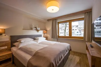 Ein Bett oder Betten in einem Zimmer der Unterkunft Apartment Gerlos 183
