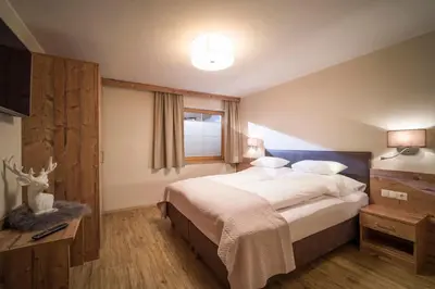 Ein Bett oder Betten in einem Zimmer der Unterkunft Apartment Gerlos 183