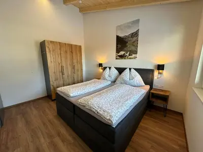 Ein Bett oder Betten in einem Zimmer der Unterkunft Appartement Kramerhaus