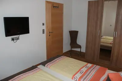Ein Bett oder Betten in einem Zimmer der Unterkunft Haus Markus