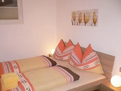 Ein Bett oder Betten in einem Zimmer der Unterkunft Haus Markus