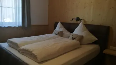 Ein Bett oder Betten in einem Zimmer der Unterkunft Haus Wildschütz