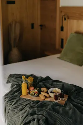 Ein Bett oder Betten in einem Zimmer der Unterkunft FRÄULEIN NANNERL - Boutique Apart mit Saunahaus