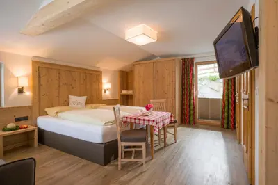 Ein Bett oder Betten in einem Zimmer der Unterkunft Hottererhof