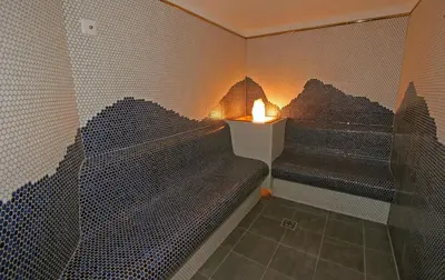 Ein Sitzbereich in der Unterkunft Hotel Simmerlwirt