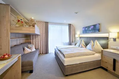 Ein Bett oder Betten in einem Zimmer der Unterkunft Hotel Hubertus