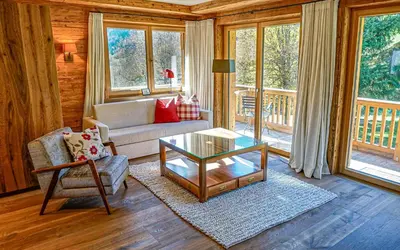 Ein Sitzbereich in der Unterkunft ALPIN CHARME APARTMENTS Boutique Chalet Kitzbichl