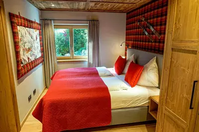 Ein Bett oder Betten in einem Zimmer der Unterkunft ALPIN CHARME APARTMENTS Boutique Chalet Kitzbichl
